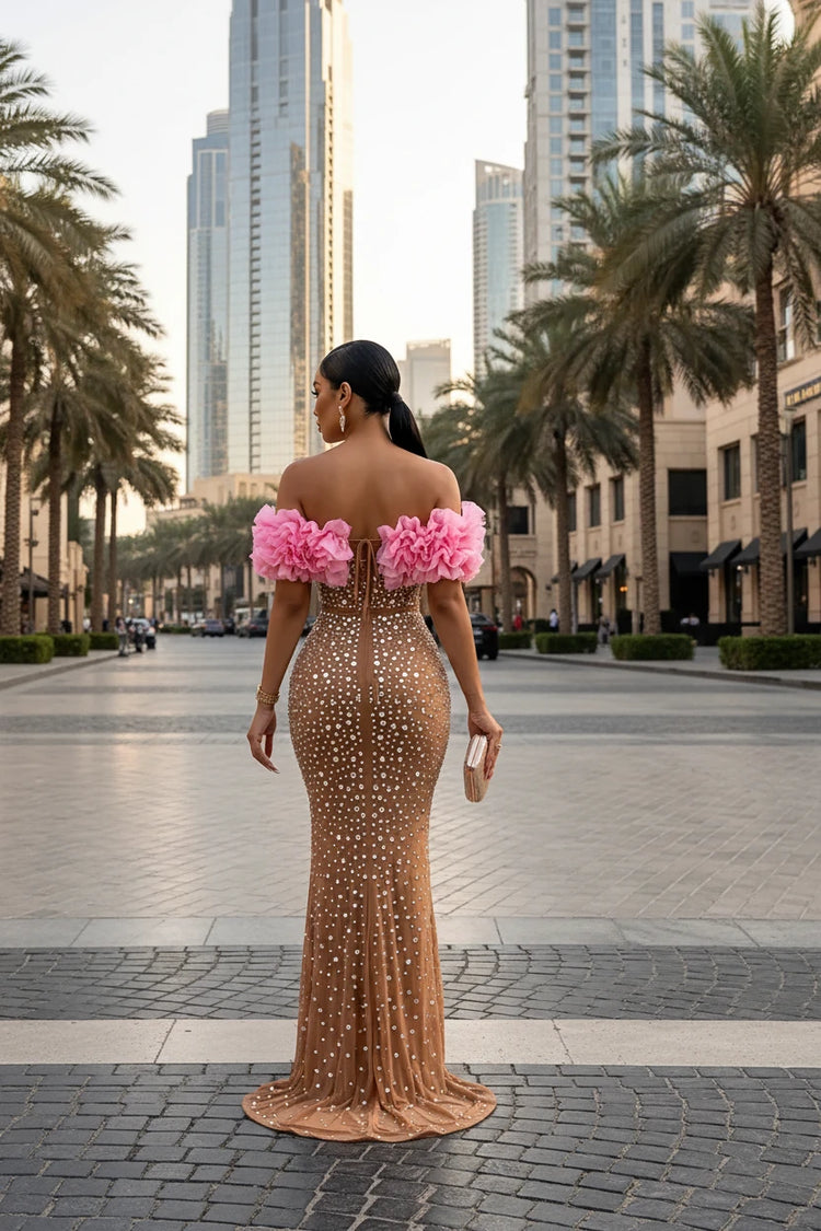 Yembi Fashion pink ruffled maxi dress with off the shoulder sweetheart neckline, sheer nude illusion mesh, silver crystals, and bold pink 3D ruffled fabric trim