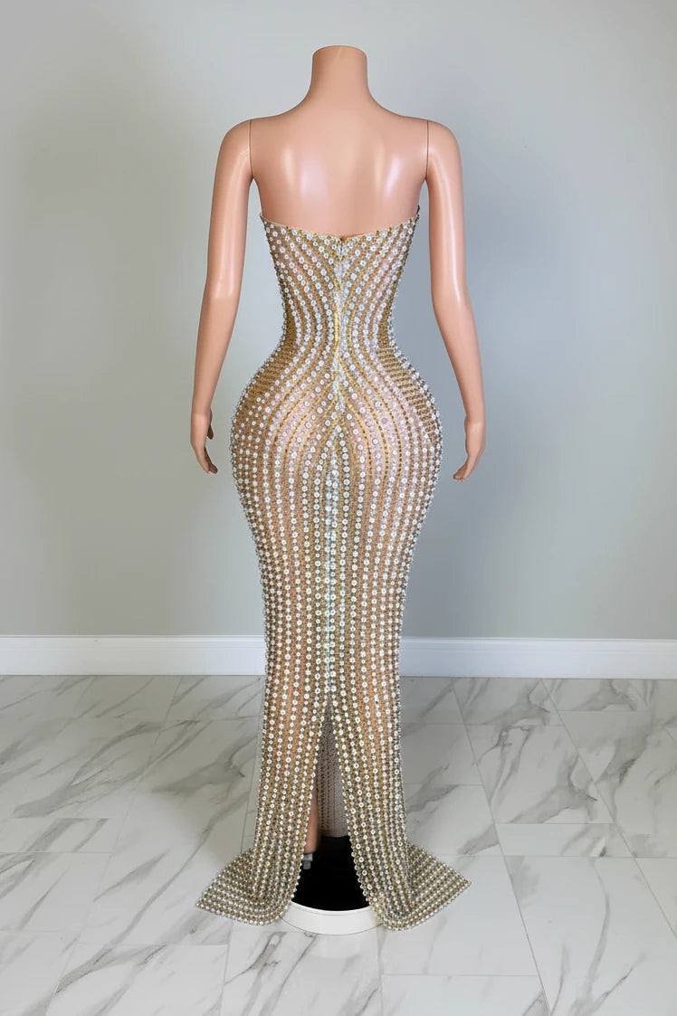 Yembi Fashion silver rhinestone maxi dress with strapless neckline, sheer nude illusion mesh, and dense vertical lines of silver crystals and pearls