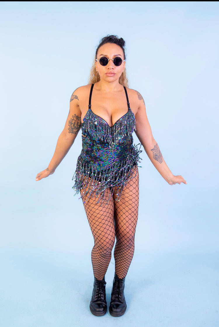 Yembi Fashion luxury black iridescent sequin bodysuit featuring an oil-slick holographic shine with cascading beaded fringe chains on a sweetheart neckline leotard