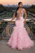 Yembi Fashion pink ruffled mermaid dress with asymmetric bodice, sheer nude-illusion mesh, baroque rhinestone embroidery, and layered tulle skirt
