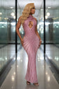 Yembi Fashion hot pink rhinestone maxi dress with dramatic chest and hip cutouts, high neck, and vertical fuchsia crystal line detailing