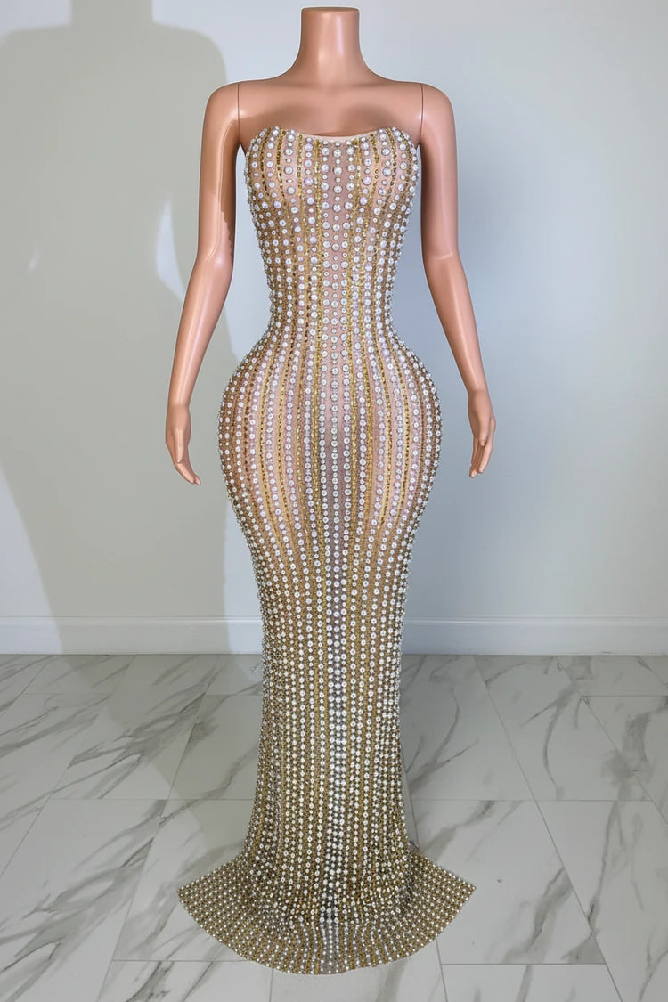 Yembi Fashion silver rhinestone maxi dress with strapless neckline, sheer nude illusion mesh, and dense vertical lines of silver crystals and pearls