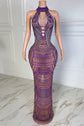 Purple beaded evening gown on a mannequin against a neutral background