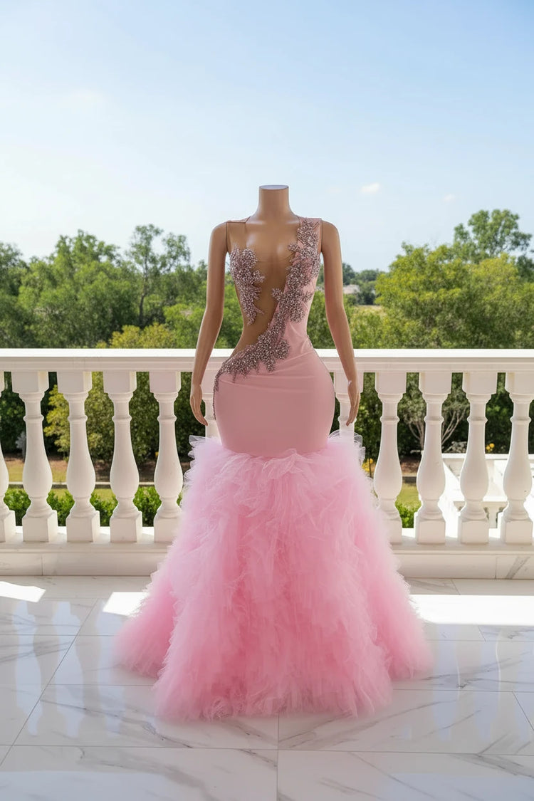 Yembi Fashion pink ruffled mermaid dress with asymmetric bodice, sheer nude-illusion mesh, baroque rhinestone embroidery, and layered tulle skirt
