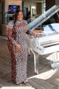 Yembi Fashion heavy crystal embellished nude illusion gown with high mock neck and dense constellation of oversized silver rhinestones on caramel mesh