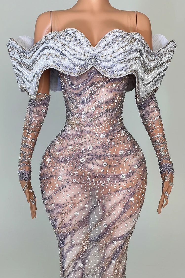 Yembi Fashion crystal embellished mermaid gown with nude illusion rhinestone mesh, sculptural ruffled wing collar, and matching embellished gloves