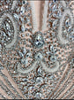  A glamorous silver sequin dress with all-over shimmering sequins and a figure-flattering silhouette, perfect for formal events and parties