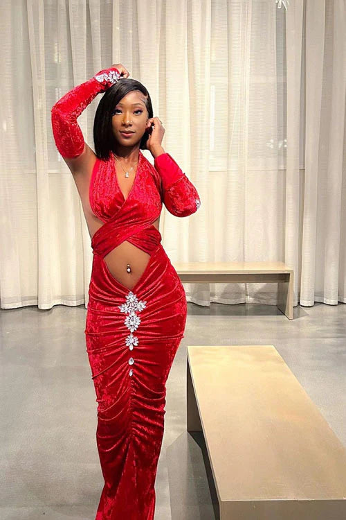 Yembi Fashion red velvet maxi dress with criss cross halter neck, dramatic stomach cutout, ruched skirt with crystal brooch, and matching long gloves