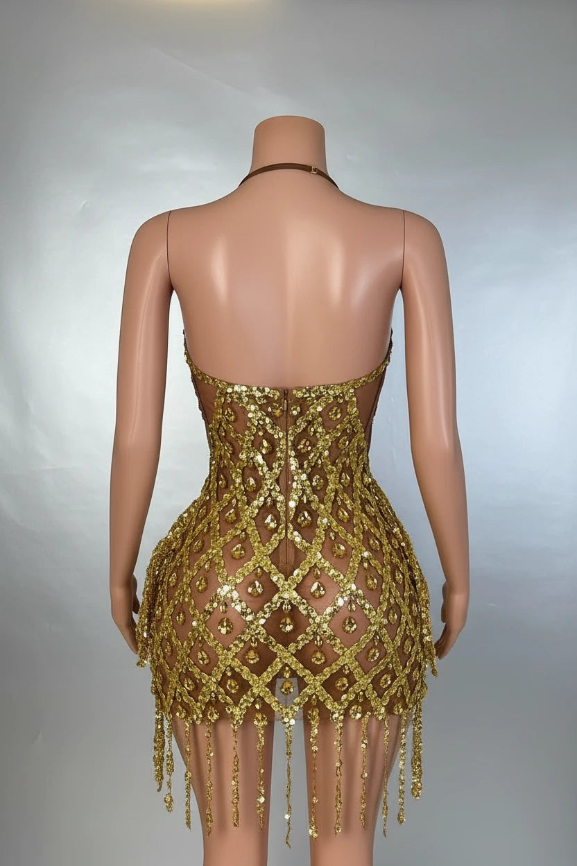 Yembi Fashion gold crystal mini dress with backless mesh cage design, geometric diamond sequin pattern, and hanging crystal fringe