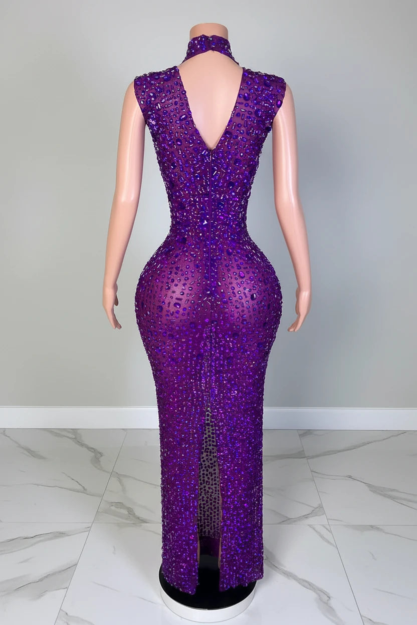 Yembi Fashion purple crystal maxi dress with high mock neck, sleeveless sheer nude illusion mesh, and heavy constellation pattern of amethyst violet rhinestones