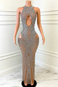 Yembi Fashion nude illusion crystal gown with central chest keyhole cutout, high neck, sheer beige mesh, and geometric vertical lines of silver rhinestones