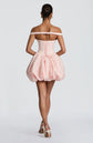Yembi Fashion luxury pink off-the-shoulder puff mini dress featuring a structured corset bodice with a plunging V-neckline and dramatic bubble skirt