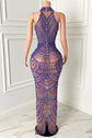 Yembi Fashion royal blue rhinestone maxi dress with nude illusion mesh, embellished halter neck, and layered metallic body chains