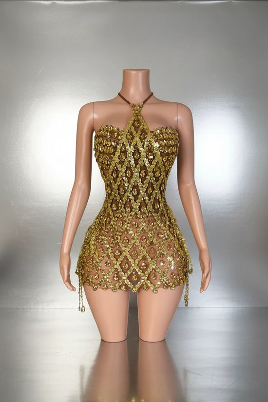 Yembi Fashion gold crystal mini dress with backless mesh cage design, geometric diamond sequin pattern, and hanging crystal fringe