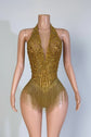 Yembi Fashion luxury gold rhinestone fringe bodysuit featuring a sparkly crystal halter bodice with a plunging deep V-neckline and cascading metallic fringe chains