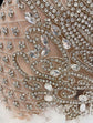 Front view of silver rhinestone mini dress with glitter details