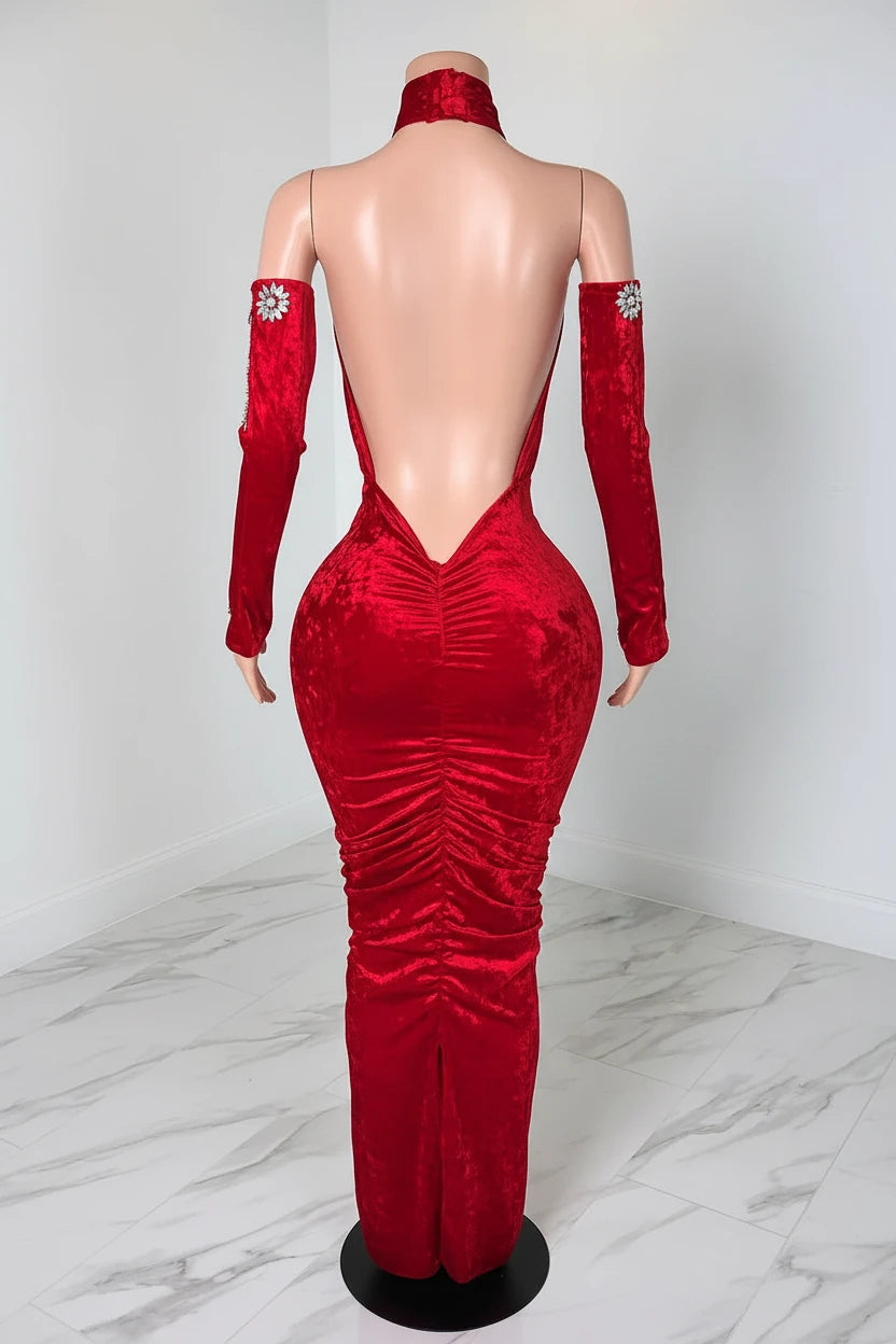Yembi Fashion red velvet maxi dress with criss cross halter neck, dramatic stomach cutout, ruched skirt with crystal brooch, and matching long gloves