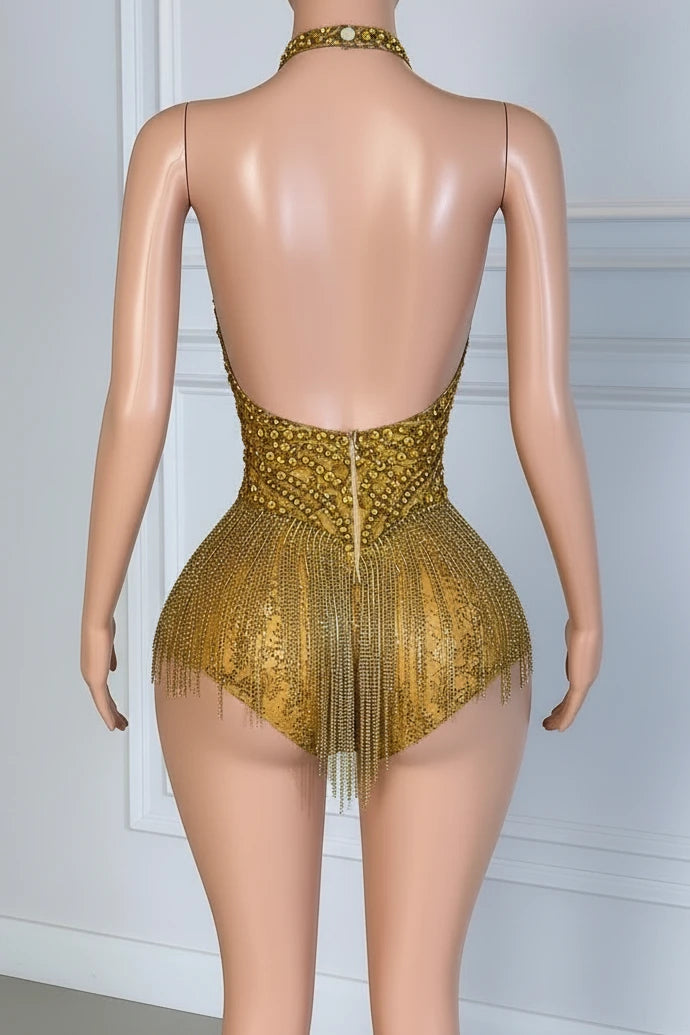 Yembi Fashion luxury gold rhinestone fringe bodysuit featuring a sparkly crystal halter bodice with a plunging deep V-neckline and cascading metallic fringe chains