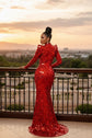Yembi Fashion red mirror maxi dress with high neck, chest keyhole cutout, geometric shattered glass mirror pieces, long sleeves, and high thigh slit