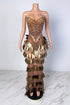 Yembi Fashion gold crystal maxi dress with strapless sweetheart neckline, sheer nude illusion mesh, amber rhinestone bodice, and tiered rows of metallic gold leaf scales