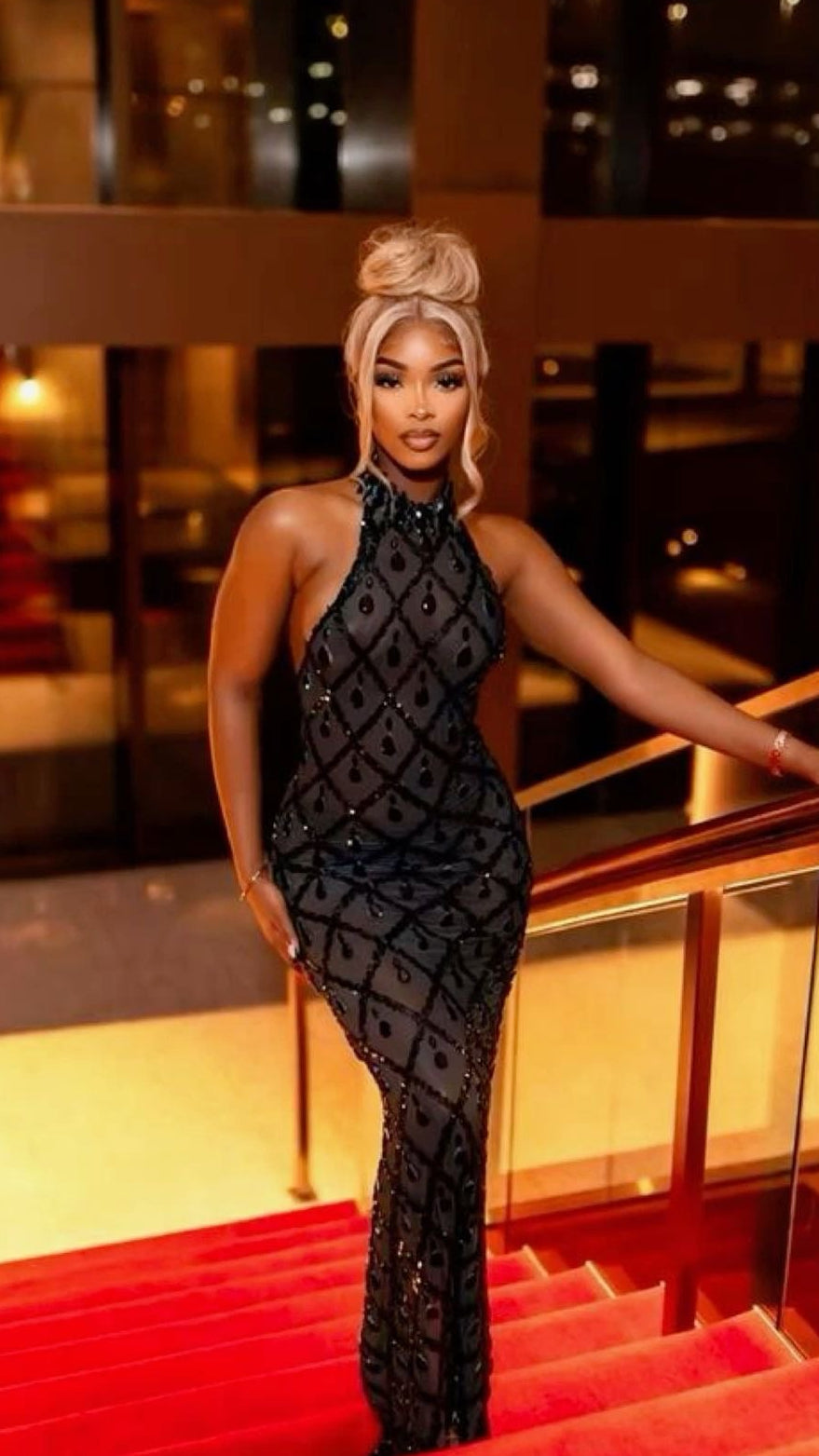 Yembi Fashion black crystal halter dress with sheer mesh, geometric diamond grid pattern, and jet-black rhinestone teardrops