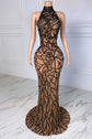 Yembi Fashion black rhinestone maxi dress with nude illusion mesh, high mock neck, and abstract crystal branching patterns