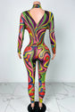 Yembi Fashion luxury multicolor rhinestone jumpsuit featuring a psychedelic abstract wavy swirl pattern of vibrant rainbow crystals on a nude illusion mock neck catsuit