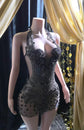 Appliqué mini dress with black rhinestones, featuring intricate detailing and perfect for parties or formal events