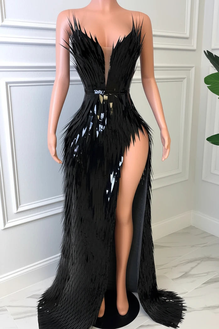 Yembi Fashion black feather maxi dress with plunging neckline, sheer nude illusion mesh cutout, silver rhinestone crystal belt, and high thigh slit