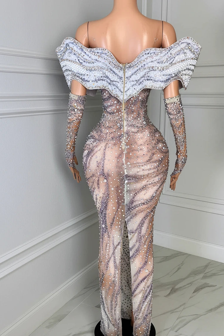 Yembi Fashion crystal embellished mermaid gown with nude illusion rhinestone mesh, sculptural ruffled wing collar, and matching embellished gloves