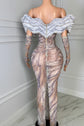 Yembi Fashion crystal embellished mermaid gown with nude illusion rhinestone mesh, sculptural ruffled wing collar, and matching embellished gloves