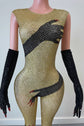 Yembi Fashion luxury gold rhinestone handprint jumpsuit featuring sparkly gold crystals and graphic black hands motif on a bodycon catsuit with matching long gloves