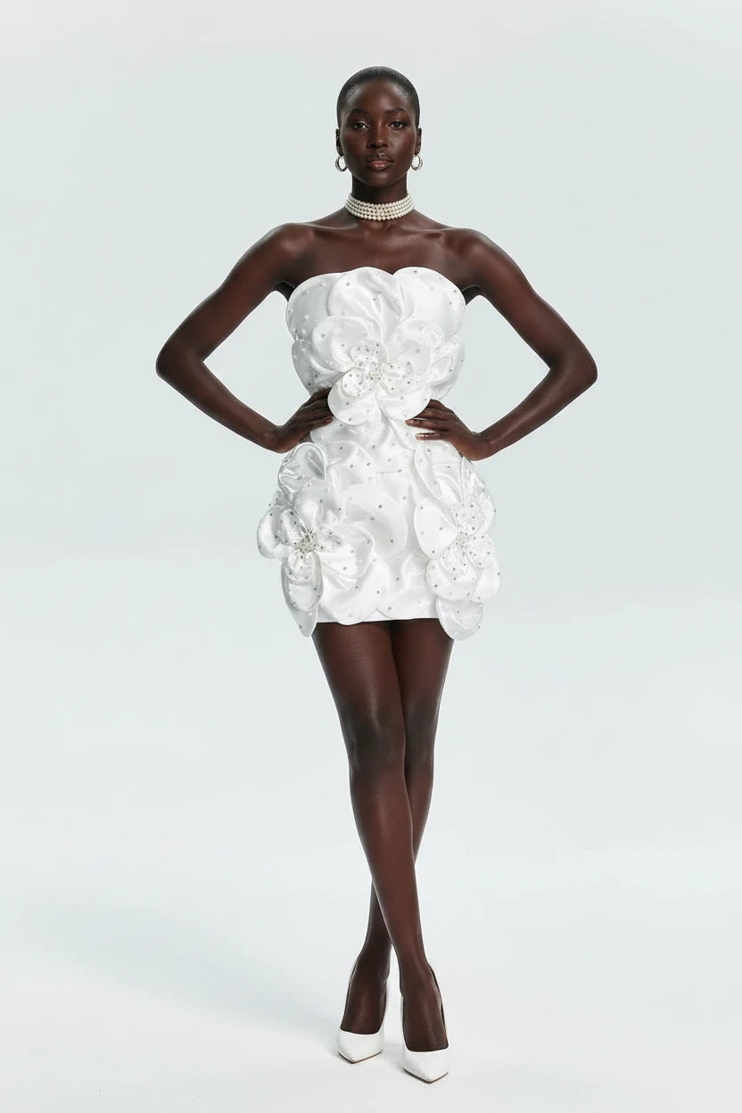 Yembi Fashion luxury white floral applique mini dress featuring a strapless sweetheart silhouette with large 3D flower appliques and scattered sparkly rhinestones