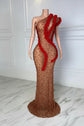 Yembi Fashion red rhinestone maxi dress with asymmetric one shoulder neckline, sheer nude illusion mesh, ruby crystals, and bold red ruffled fabric trim