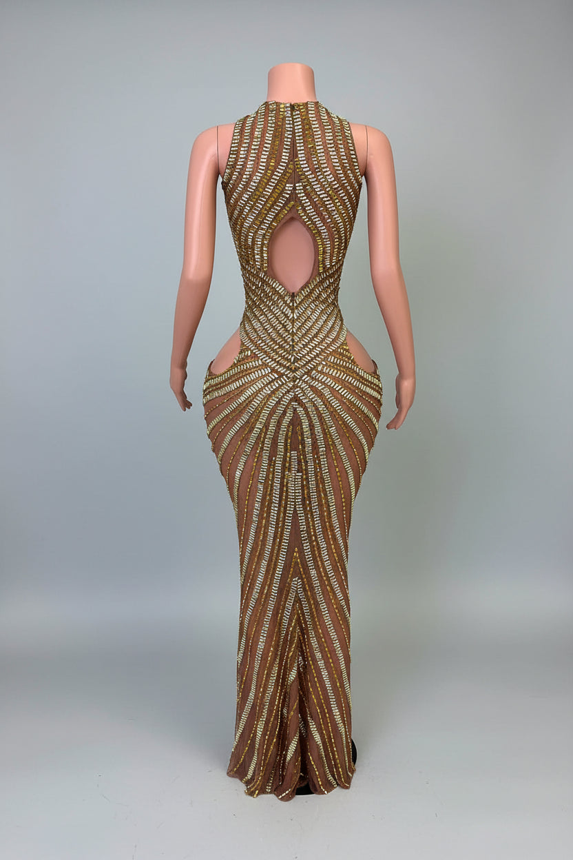 Yembi Fashion gold rhinestone maxi dress with dramatic chest and hip cutouts, high neck, and vertical gold crystal line detailing