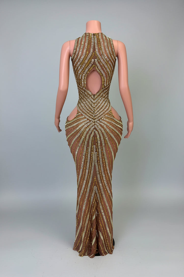 Yembi Fashion gold rhinestone maxi dress with dramatic chest and hip cutouts, high neck, and vertical gold crystal line detailing