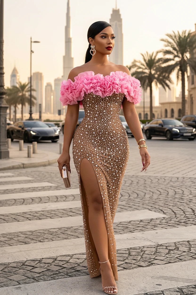 Yembi Fashion pink ruffled maxi dress with off the shoulder sweetheart neckline, sheer nude illusion mesh, silver crystals, and bold pink 3D ruffled fabric trim