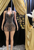Appliqué mini dress with black rhinestones, featuring intricate detailing and perfect for parties or formal events