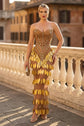 Yembi Fashion gold crystal maxi dress with strapless sweetheart neckline, sheer nude illusion mesh, amber rhinestone bodice, and tiered rows of metallic gold leaf scales