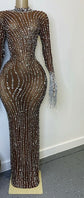 Yembi Fashion nude illusion crystal gown with sheer brown mesh, vertical wavy silver rhinestone patterns, and hanging crystal fringe cuffs