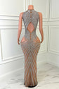 Yembi Fashion nude illusion crystal gown with central chest keyhole cutout, high neck, sheer beige mesh, and geometric vertical lines of silver rhinestones