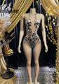  Silver bodysuit with mirror accents, sleek and reflective design for parties or festivals.