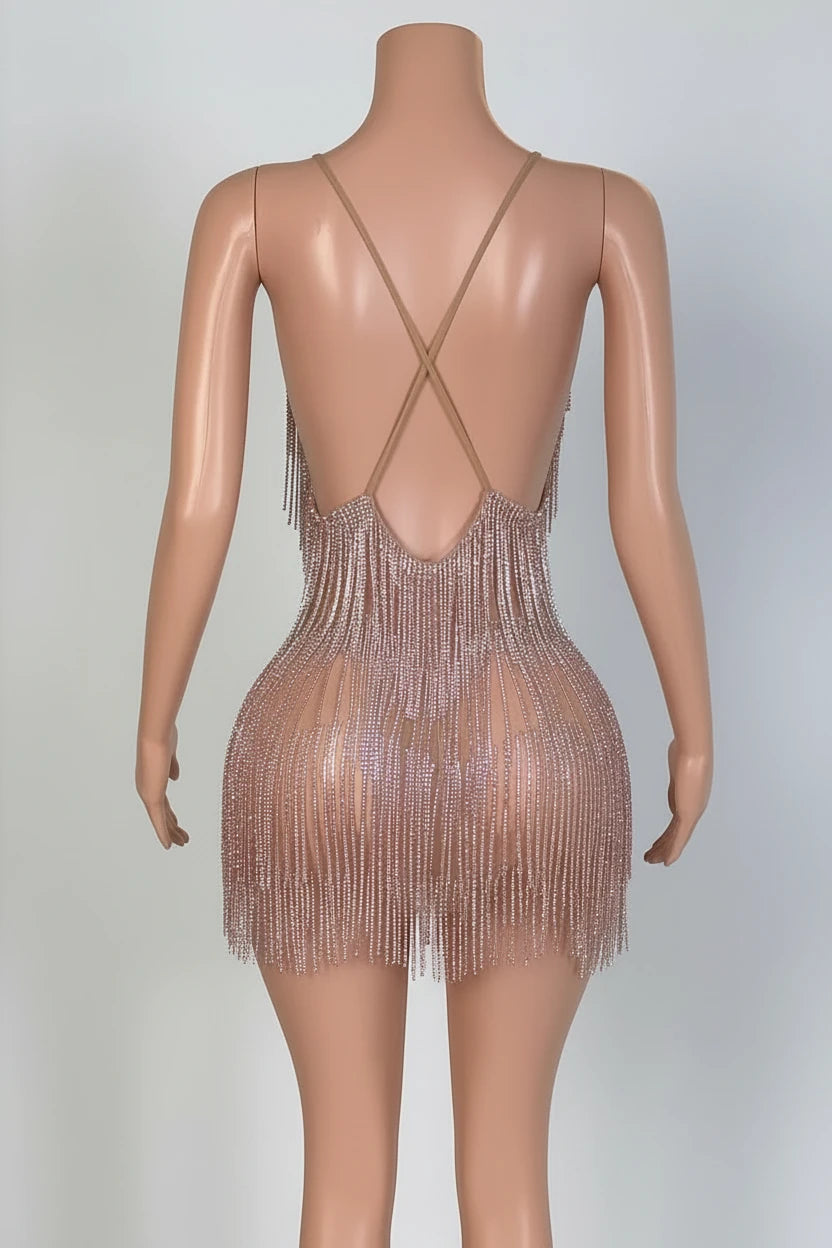 Yembi Fashion pink rhinestone fringe mini dress with V-neckline, sheer nude illusion mesh, and vertical hanging crystal tassel strands