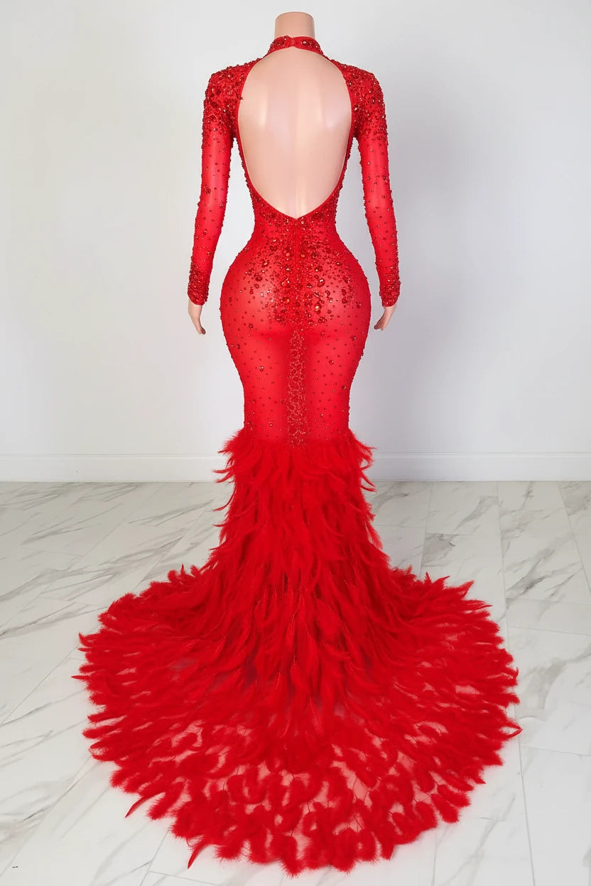 Yembi Fashion red feather crystal gown with high mock neck, long sleeves, nude illusion mesh bodice with ruby rhinestone beadwork, and plush ostrich feather mermaid train