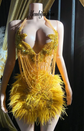 A gold crystal rhinestone birthday party dress with intricate crystal detailing, perfect for glamorous events like birthdays or cocktail parties.
