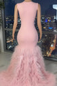 Yembi Fashion pink ruffled mermaid dress with asymmetric bodice, sheer nude-illusion mesh, baroque rhinestone embroidery, and layered tulle skirt
