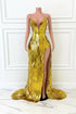 Yembi Fashion gold feather maxi dress with plunging neckline, sheer nude illusion mesh cutout, silver rhinestone crystal belt, and high thigh slit