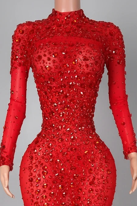 Yembi Fashion red feather crystal gown with high mock neck, long sleeves, nude illusion mesh bodice with ruby rhinestone beadwork, and plush ostrich feather mermaid train