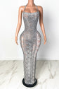 Yembi Fashion silver rhinestone maxi dress with halter neckline, sheer nude illusion mesh, vertical crystal lines, and layered hanging rhinestone fringe strands