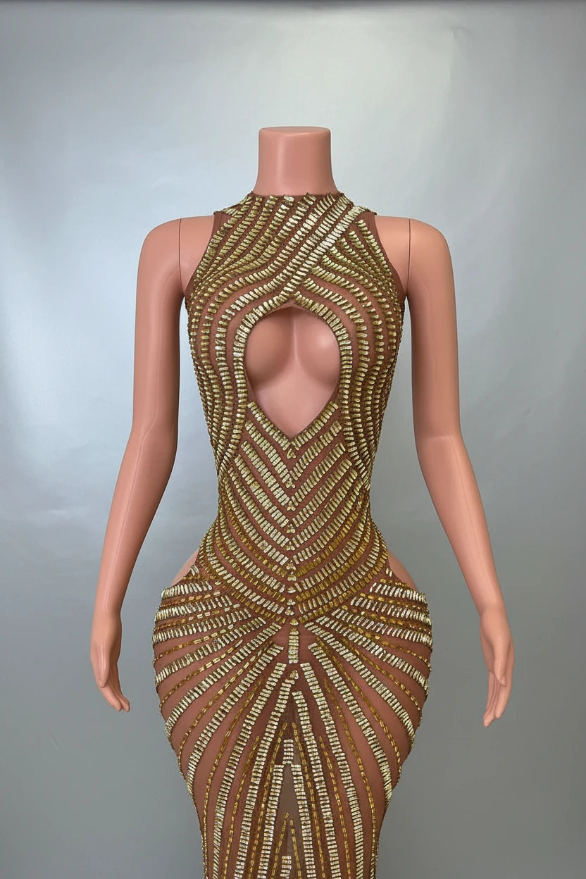 Yembi Fashion gold rhinestone maxi dress with dramatic chest and hip cutouts, high neck, and vertical gold crystal line detailing